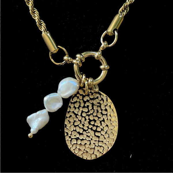 gold charm with fresh water pearls