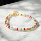 pink and multi coloured beaded friendship bracelet
