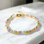 green and multi coloured beaded friendship bracelet